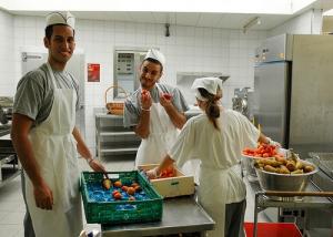 People helping in Caux