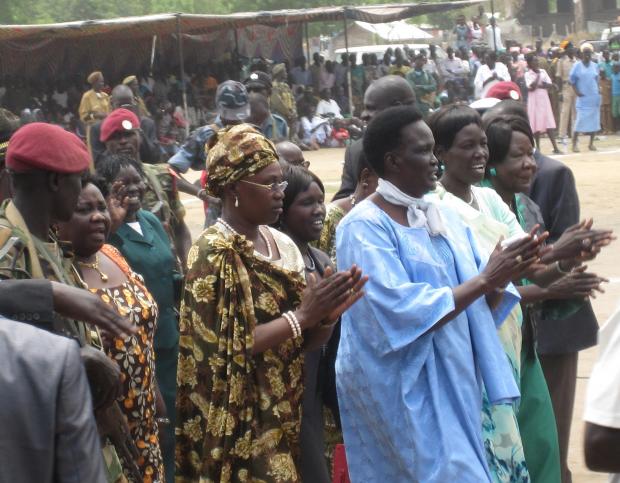 Madame Angelina Teny (left) marches with Madame Rebecca Nyandeng De Mabior (centre in blue), Presidential advisor and widow of the late leader, John Garang, March 8 2013 (Photo: Jean Brown)