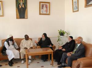 Meeting with Father Basilius and Father Johnna Al-Makari at St Macarius Monastery. Far right: Muslim scholar Ahmed Al-Saeh. (Photo: Imad Karam)