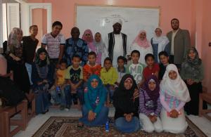 Imam Ashafa, Pastor James and the organizers with the children and young people at Ezbit Al-Hagana local project on 1 June, 2009. (Photo: Amira  Karam)