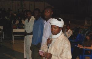 Youth line up to comment after an open-air screening of An African Answer in Abeche, eastern Chad (Photo: Alan Channer)