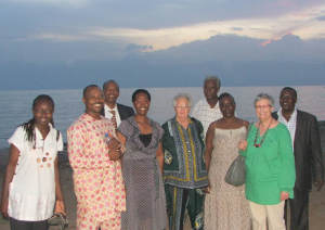 ACG with Burundian hosts. Lake Tanganyika in the background         and the mountians of Eastern DRC on the horizon