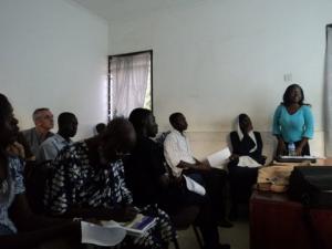 Joanne Nabbanja (standing) addressing the students