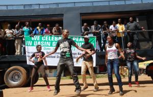 The caravan's dance troupe performs for the crowd