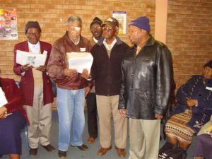 Male participants rendering a song (Photo: Jackie Euvrard)