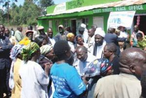 Imam Ashafa and Pastor Wuye join people from Burnt Forest, Kenya, to celebrate the opening of a Peace Office in the town. The festivities, which were the culmination of several days of intensive mediation by Ashafa and Wuye, were covered by national newspapers and television. Burnt Forest was the area worst affected by inter-ethnic violence following Presidential elections at the end of December, 2007. (Photo: Alan Channer)