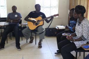 WfA Participants share a song during the retreat 