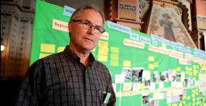 Rob Corcoran in front of the timeline (Photo: Charlotte Sawyer)