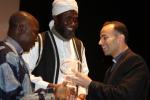 Imam Ashafa and Pastor James receive the 2009 Spiritual Solidarity Award from Father Daou