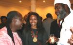 Pastor James Wuye, left, and Imam Muhammad Ashafa, right, with Wanjiku Kibunja from Kenya