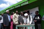 Signing the Sorry Book outside the newly-opened Peace Office