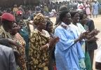 Madame Angelina Teny (left) marches with Madame Rebecca Nyandeng De Mabior (centre in blue), Presidential advisor and widow of the late leader, John Garang, March 8 2013