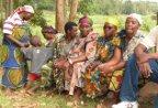 Burundian hill women listening to Daphrose